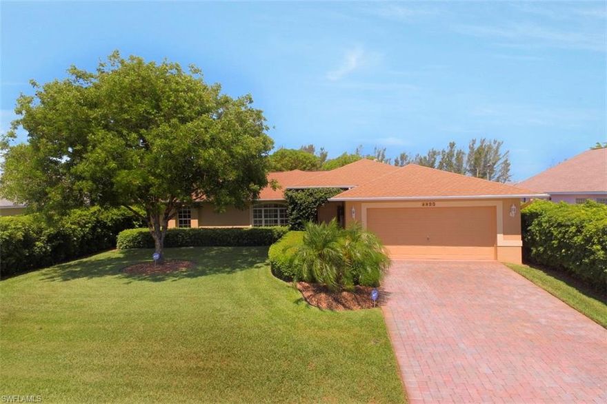 Lushly landscaped OASIS in Paradise! Don't miss this EXQUISITE, BEAUTIFULLY DETAILED split-plan home in a Quiet neighborhood IDEALLY LOCATED near Pine Island Corridor amenities. Freshly painted & GORGEOUSLY UPGRADED inside & out! Bright & Cheerful Open-Plan Kitchen features high-end Appliances including 36 cu’ Kenmore Elite Fridge & Double oven; Bosch DW; Commercial-grade Jenn-Aire Stainless Range Hood. All this + Pantry, under-cabinet lighting & glass tile back-splash! Master Suite offers Walk-in closet, dual sinks & Frameless Glass Shower enclosure. Designer touches thru-out this PRISTINE well-loved home include Plantation Shutters & Recessed lighting. You'll LOVE the luxuriously appointed Lanai under truss w/Travertine Tile floor, custom Phantom screening & PRIVATE back yard. You simply will not find these upgrades at this price anywhere~~Paver drive & walkway; Surround Sound; Whole-house R/O system; Auto-sprinklers; Landscape lighting; Epoxy garage floor; Storm shutters; & Retaining wall. Room for a Pool. Great location near outstanding schools, state-of-the art Library, 2 health clubs, excellent shopping & dining. IMMACULATE, PRICED RIGHT & Ready for YOU!