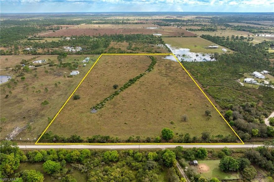 TRANQUIL 20 ACRES OF IMPROVED PASTURE LOCATED ON SHELL-GRADE GATEWAY LANE JUST OFF OF PAVED JACK'S BRANCH AND KIRBY THOMPSON ROADS. Tract has some native trees and perimeter fencing with double-gated entry. This location provides easy access into Fort Myers/Naples/etc. with the Lee/Hendry County line on CR 78/North River Road only 6+/- miles west. For those planning to build, subject property is not in a flood zone. Property is currently leased for cattle for low-low ad valorem tax bill of $80+/- per year. This is a perfect getaway spot - build a cabin or add a mobile or modular home or build your dream home/primary residence. The perfect location for a mini-ranch - bring your kids and let them enjoy horses, cows, and chickens instead of video games! RETURN TO THE JOY OF COUNTRY LIVING!