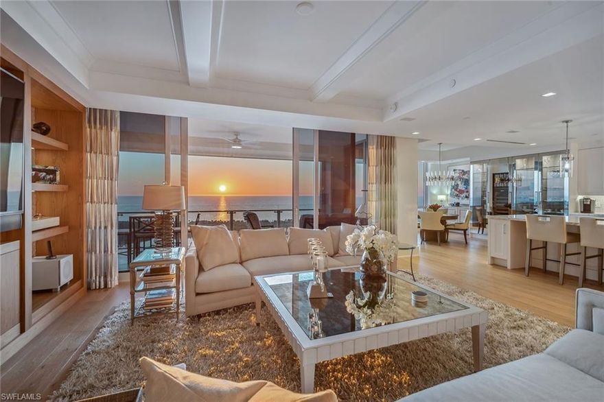 Transferable IMMEDIATE GOLF MEMBERSHIP to an exclusive private club is available with this spectacular condominium. Mystique is the newest high-rise luxury building in Pelican Bay, overlooking the majestic blue waters of the Gulf. Prepare to be captivated by the breathtaking views and enchanting sunsets with expansive floor-to-ceiling windows from the 19th floor of this prestigious building. Designed by a renowned interior designer and showcasing a sophisticated palate with highlights including elevated ceiling height, backlit Onyx bar counters, exquisite wall coverings, custom wood columns and walls, pristine white kitchen with Carrara marble countertops, Legno Bastone Italian wood floors and beautiful custom finishes throughout. No expense was spared in this gorgeous condominium. Experience the convenience of 24/7 concierge services, making every day feel like a five-star experience. In the exclusive Pelican Bay community, you will have access to a variety of resort-style amenities including private beach access with beach club, chair and umbrella service, beachfront dining, tennis courts with pickleball coming soon, fitness and community center, miles of walking and bike paths, and more. Centrally located and within short distance of Artis-Naples and Waterside Shops offering unparalleled convenience and luxury. This is more than a home, it's a lifestyle.