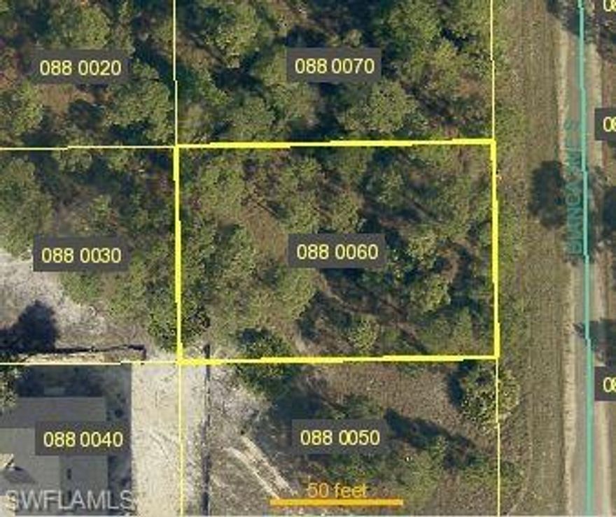 Build Your Dream Home! Mature Pine trees on vacant parcel in southeast Lehigh. Growing neighborhood that is not far from main thoroughfare to head west into Fort Myers and Cape Coral. At .25 acres, this residential lot is waiting for the right owner to build a home. No restrictions!