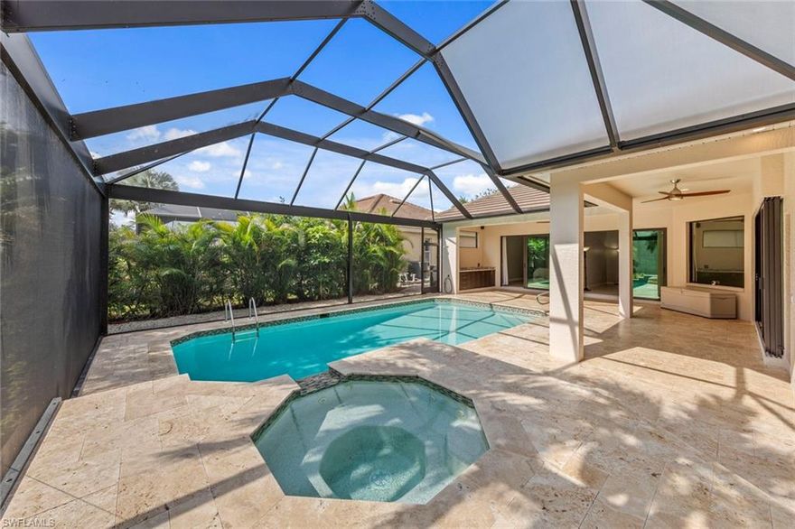 This rarely available Magnolia floor plan offers a flexible layout perfect for a variety of lifestyles. Thoughtfully  designed split bedroom home offering four bedrooms and three full baths, family room with breakfast nook, over-sized living room and separate dining room.  Whether you're working from home, growing your family, or looking for space to enjoy hobbies, this home checks all the boxes.. The true standout feature of this home is the newly remodeled outdoor retreat and grill lover’s dream kitchen. All new travertine decking, new extended cage are with insulated roof over a fully equipped outdoor kitchen—complete with a flat top grill, dishwasher, cabinetry, and more. Saltwater pool remodeled in 2021 with beautiful resurfacing and coping, app-operated Jandy system. Just beyond this amazing lanai is an abundance of private green space ideal for play or planting! More major updgrades: roof (2019), hurricane impact windows/sliders(2024), AC(2022), more to see on upgrade sheet. Autumn Woods offers a gated community with a clubhouse, fitness center, pool, pickleball, tennis, basketball, playground, and more—all in a prime location near top schools, Gulf beaches, and shopping/dining at Mercato and Waterside Shops.