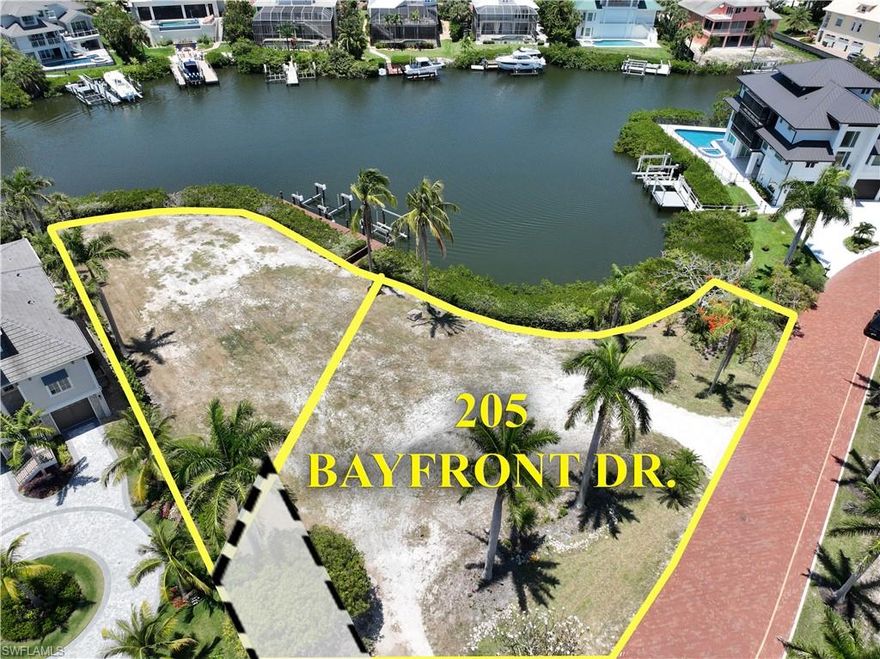 This large bayfront lot (PID# 23095002951) is located in the double gated Bayfront Gardens and within the beautiful community of Barefoot Beach. This lot features 158’ of waterfront, is the ultimate location to build your 3 or 4 story luxury waterfront home and will provide wide water views plus there are no homes across the street - just a beautiful nature preserve. The lot is 13,866 SQ FT (.318 acres) and has all utilities at the lot. You will be able to design your custom boat dock with lift and jet ski lift that will provide a short ride to the Gulf of Mexico with no bridges. And best of all - it is just a short walk to the white sandy beaches of Barefoot Beach via one of two private beach accesses for use by Bayfront Gardens residents. The previous home was removed and will result in no impact fees at permitting - a huge savings. A recent survey is available with all setbacks indicated. Barefoot Beach is one of Collier Counties most desirable Beach to Bay communities and includes one of the highest ranked beaches in the country, 24 hour guard patrols, manned guard gate, and the option to join the fantastic Club at Barefoot Beach including its full service attendants at the beach and pool, casual and fine dining, a busy event calendar, tennis with pro and more. Put a deposit for a membership when purchasing the lot and the wait list should be over when your house is finished plus you will have limited usage during the wait.