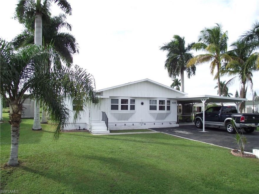Looking for a manufactured home with voluntary HOA fees and you own the land as well??  Clean, well taken care of and turnkey. Close to Fort Myers Beach and Sanibel Island.  This home is on an oversized corner lot with a 20' X 22' detached garage, and a 22' X 11' carport.  Large 15' X 26' screened lanai that wraps around to an additional 24' X 25' screened lanai at the rear of the home where you can relax in your private in-ground spa. Also, outside and off of the covered lanai is the 12' X 10' laundry room.   Inside the home a great deal of upgrading has been completed.  3 bedrooms, with 2 updated bathrooms, windows were replaced in 2011, partial roof was replaced 2011.  Right side lanai and carport combination was replaced in 2011.  December 2015, a new aluminum rolled roof placed over main living areas of home, roof comes with a transferable lifetime warranty.