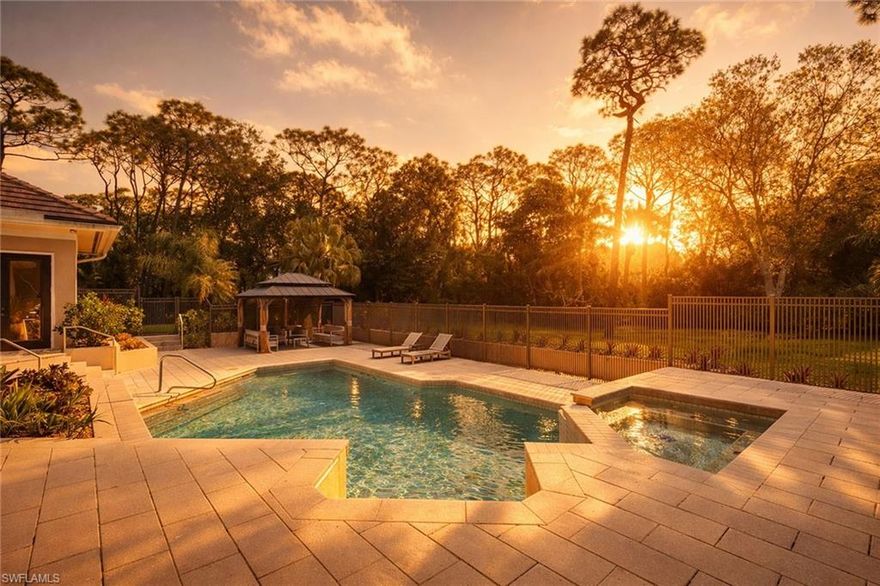 Situated on over a 1-acre homesite in a prime in town location, this single-story residence offers exceptional space and privacy. The property features six air-conditioned garage bays, ideal for a car collector, with wall-mounted openers allowing room for vehicle lifts and additional cars. With over 3,000sqft of living space, the home includes 3 ensuite bedrooms plus a den/office, high ceilings, and a split floor plan filled with natural light. This beautiful property is being offered mostly furnished. The outdoor living area features a saltwater pool/spa with waterfall, a gazebo, and covered lanai, surrounded by new pool decking and lush landscaping. The fully fenced property includes a custom electric gate and ample space for recreation or future additions. Additional highlights include a new tile roof (2021), whole-house generator, 50-amp RV outlet and city water. Ideally located just minutes from Gulf beaches and directly across from Waterside Shops, Mercato, fine dining and premier shopping, this Pine Ridge property offers the rare opportunity to enjoy acreage living in the heart of Naples with no HOA and no flood insurance required.