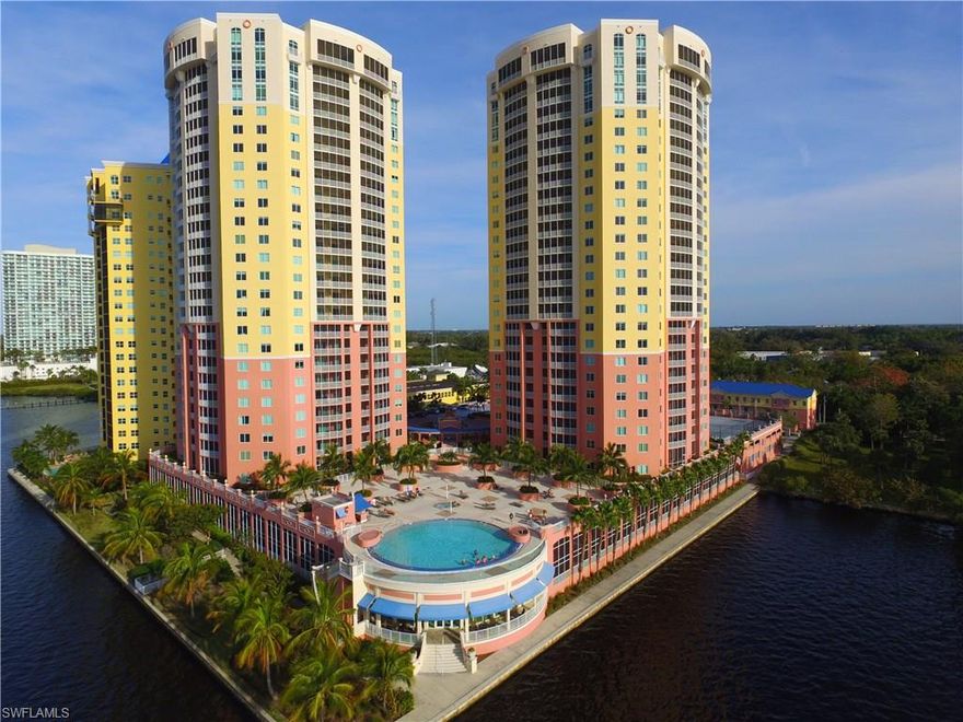 Your experience begins as you step off of your private elevator onto the 23rd floor. The entry features elegant custom painting which continues throughout this lovely 3 bedroom 2 bath home. Upgrades include cabinets in both the kitchen and bath, granite counter tops, stainless steel appliances and a spectacular smoked glass backsplash in the kitchen and accent walls. Custom Hunter Douglas blinds and tile throughout add a touch of elegance. Lighting fixtures have been upgraded as well. This home is being offered furnished and comes with one parking space. St. Tropez is located in the Historic River District of Downtown Fort Myers. Seasonal trolley service provides easy access to fine dining, nightlife, shopping and more. Some of the many amenities at St. Tropez include concierge service, a theater room, private function room, an exercise room, bicycle rack, kayak storage as well as on site management. Another outstanding feature is the spa  and infinity edge pool that looks out over the majestic Caloosahatchee River. Come get your piece of Florida living.