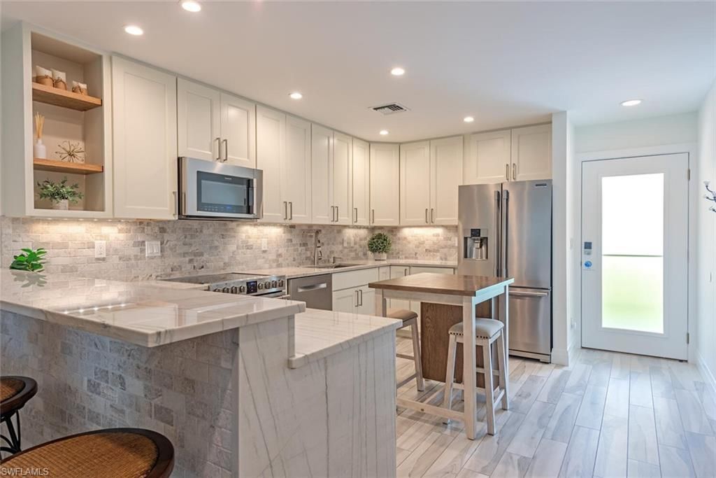 Photo of 1417 Chesapeake AVE #202, NAPLES, FL 34102 (MLS # 226012656)