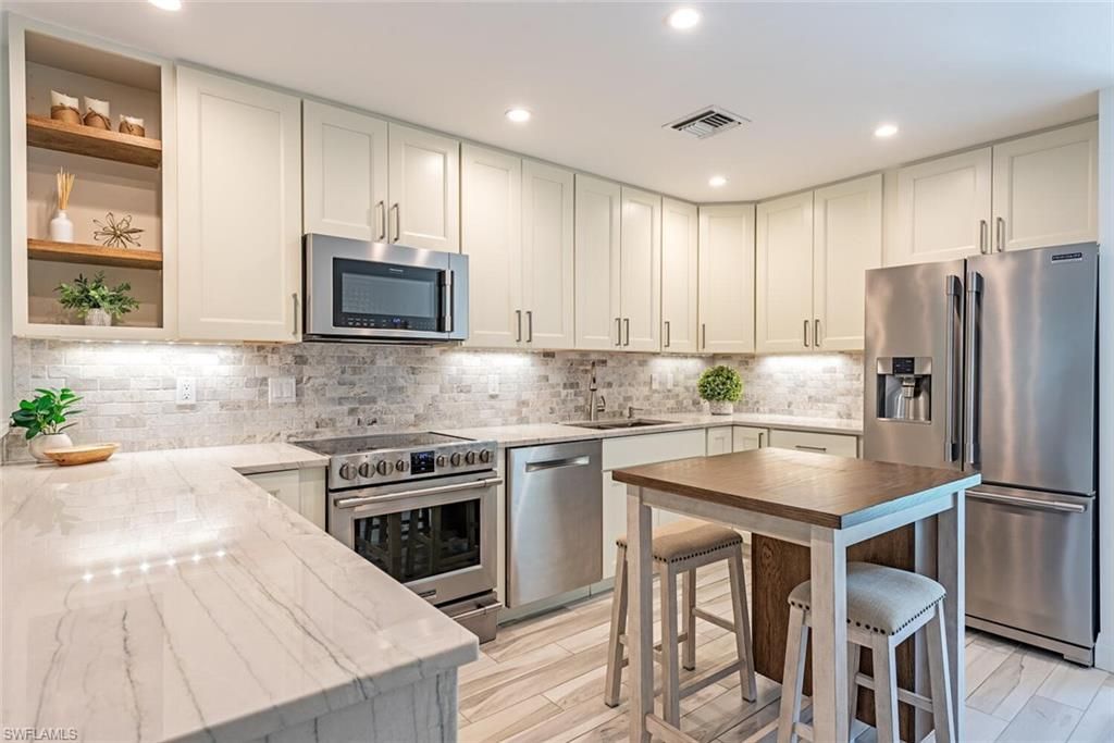 Photo of 1417 Chesapeake AVE #202, NAPLES, FL 34102 (MLS # 226012656)