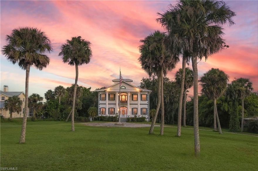 Timeless Riverfront Grandeur on the Caloosahatchee.  Experience the pinnacle of Southern elegance in this stately Greek Revival masterpiece, perfectly positioned on over an acre of prime riverfront in historic Alva. Framed by soaring columns and majestic oaks, this estate offers a rare blend of architectural significance and serene waterfront living.

The Residence, from the grand foyer’s soaring ceilings to the light-filled formal spaces, every inch of this home is designed for grace. The heart of the home is a seamless indoor-outdoor sanctuary; wide sliding glass doors in the living room and kitchen retract completely, opening to a sprawling screened porch that captures constant river breezes. Whether hosting a gala or enjoying a quiet morning coffee, the backdrop of the Caloosahatchee is ever-present. Truly elevated living with an elevator servicing all levels, ensuring long-term accessibility.  A sanctuary featuring a cozy fireplace, spa-like en suite, and dual walk-in closets. Beyond the 3 bedrooms and den, the ground level offers a massive garage/flex space ready to be transformed into a professional studio, private gym, or collector’s gallery.  Dual laundry rooms (one per floor) and a kitchen designed for large-scale entertaining.  Located on the charming, tree-lined Historical Pearl Street in "downtown" Alva, this property captures "Old Florida" at its finest. Down the street from the Alva Boat Ramp, Alva Museum and the Alva Post Office.  Spend your evenings on the sweeping back balcony watching spectacular sunsets over your private estate, all while being just a short drive from the modern conveniences of Fort Myers.