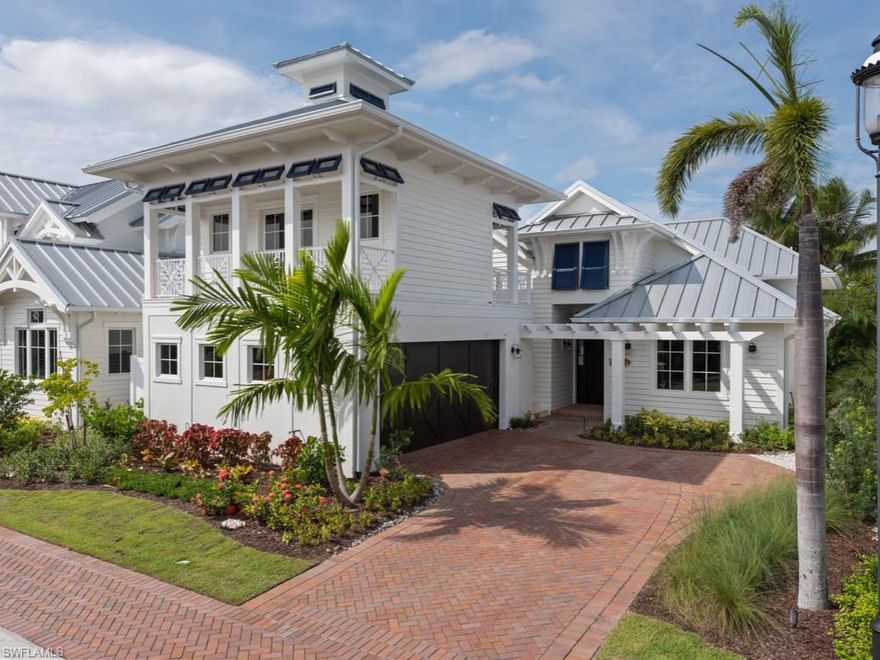 November 2021 Occupancy! Luxuriously appointed and FURNISHED by Clive Daniel Interiors, this Captiva II waterfront plan (Lot 29) in Mangrove Bay offers 4 bedrooms including private-entry guest cottage above the garage. PRIVATE BOAT SLIP INCLUDED. Masterfully designed single-story main house with custom Ruffino cabinetry, white oak wood flooring throughout, specialty mosaic tile work in baths, tongue & groove ceiling & wall treatments, gourmet kitchen with Wolf/Subzero appliances (including gas range) & expansive covered outdoor terrace w/ grilling station, outdoor fireplace & electronic screen protection. Tropical pool & spa area with Shellstone decking. CBS construction,standing seam aluminum roof,natural gas feed. Mangrove Bay is nestled along the Gordon River in Old Naples & adjacent to Baker Park, the Naples Dog Park, 5th Avenue Shopping & Dining & the Gulf Beaches. Mangrove Bay offers a luxury resident Wellness Center with state-of the art- fitness room, resident lounge, ground level kayak/paddle board storage and private boat ramp.