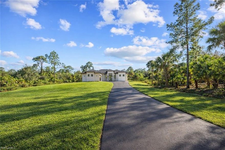 ** BUILDER INCENTIVE FOR BUYER HOME WILL INCLUDE WASHER AND DRYER!!** THIS HOME IS READY TO MOVE IN NOW!! , UPLAND 2.73 ACRES ** Welcome to this stunning brand-new construction home nestled on 2.73 acres of peaceful, open land. Designed with both style and functionality in mind, this spacious residence features 4 bedrooms and 3 beautifully finished bathrooms, complete with upgraded tile flooring throughout and elegant quartz countertops that add a touch of modern luxury. The home is built with high-impact glass windows and doors, providing security, energy efficiency, and abundant natural light. Enjoy the freedom of NO HOA fees and endless possibilities for your outdoor lifestyle. There's plenty of room to build a large pool, park your boats, RVs, or work trucks, and even create your own fruit and vegetable garden. The covered patio area is perfect for barbecues and entertaining, surrounded by tranquility and space to unwind. Conveniently located just off Everglades Blvd. S and 6th Ave SE, you're only minutes away from top-rated restaurants, premier shopping centers, and the beautiful beaches of Southwest Florida. Whether you're looking for a quiet escape or a place to live and entertain with ease, this home truly has it all. Don’t wait — homes like this go fast! **REALTORS PLEASE SEE REMARKS**