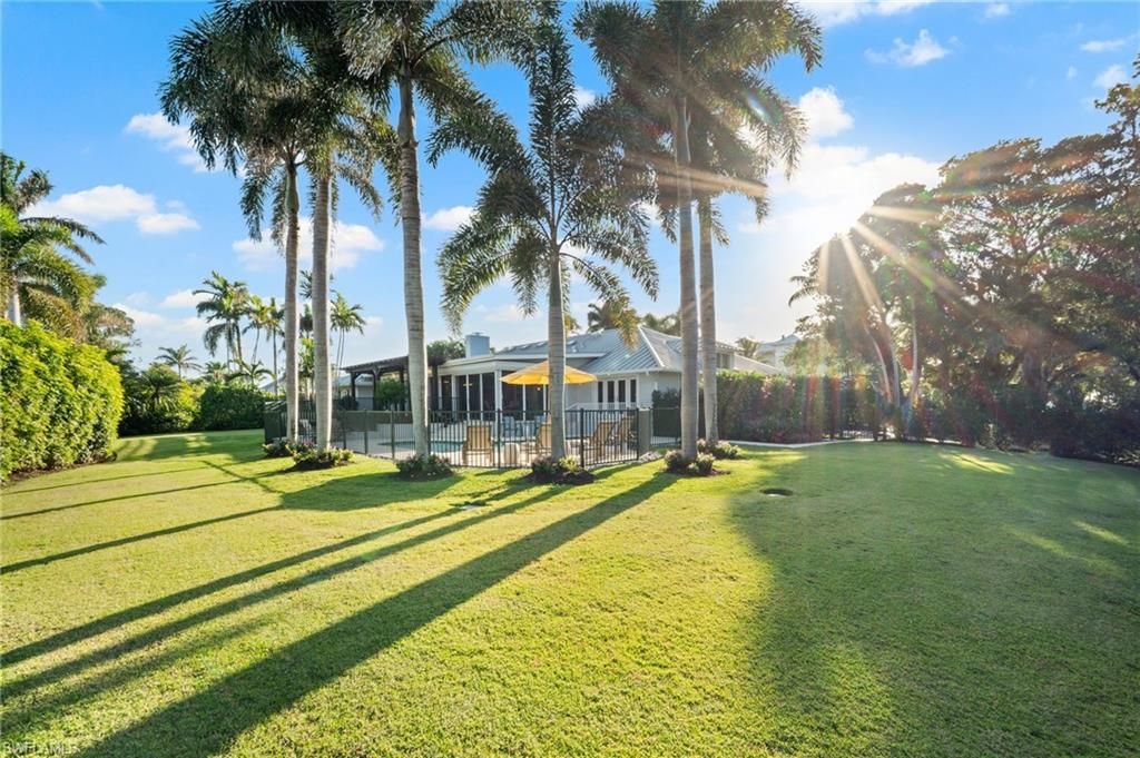 Photo of 1180 OLEANDER DR, NAPLES, FL 34102 (MLS # 225078854)