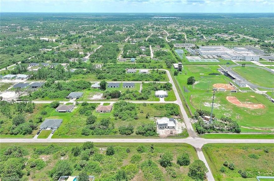 This spacious property offers the perfect opportunity to build your dream home or invest in one of Southwest Florida's fastest-growing communities. Located on a well-maintained boulevard with easy access to SR-82, shopping, schools, and local amenities. Enjoy the peaceful surroundings of this residential neighborhood while still being close to all that Fort Myers has to offer. Whether you're a builder, investor, or future homeowner, this property is full of potential.