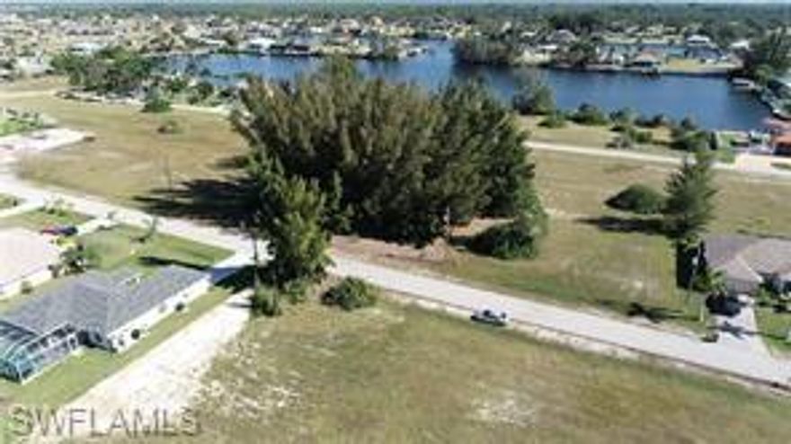 Incredible opportunity west of Old Burnt Store Road in NW Cape Coral. This prime location is in a highly desirable and rapidly growing area, just minutes from boat ramps, golf courses, beaches, islands, shopping, dining, and entertainment. Build your Florida dream home or secure a smart investment for the future. Special opportunity: the adjacent triple building lots to the left and right are also available, offering a total of four contiguous building lots.