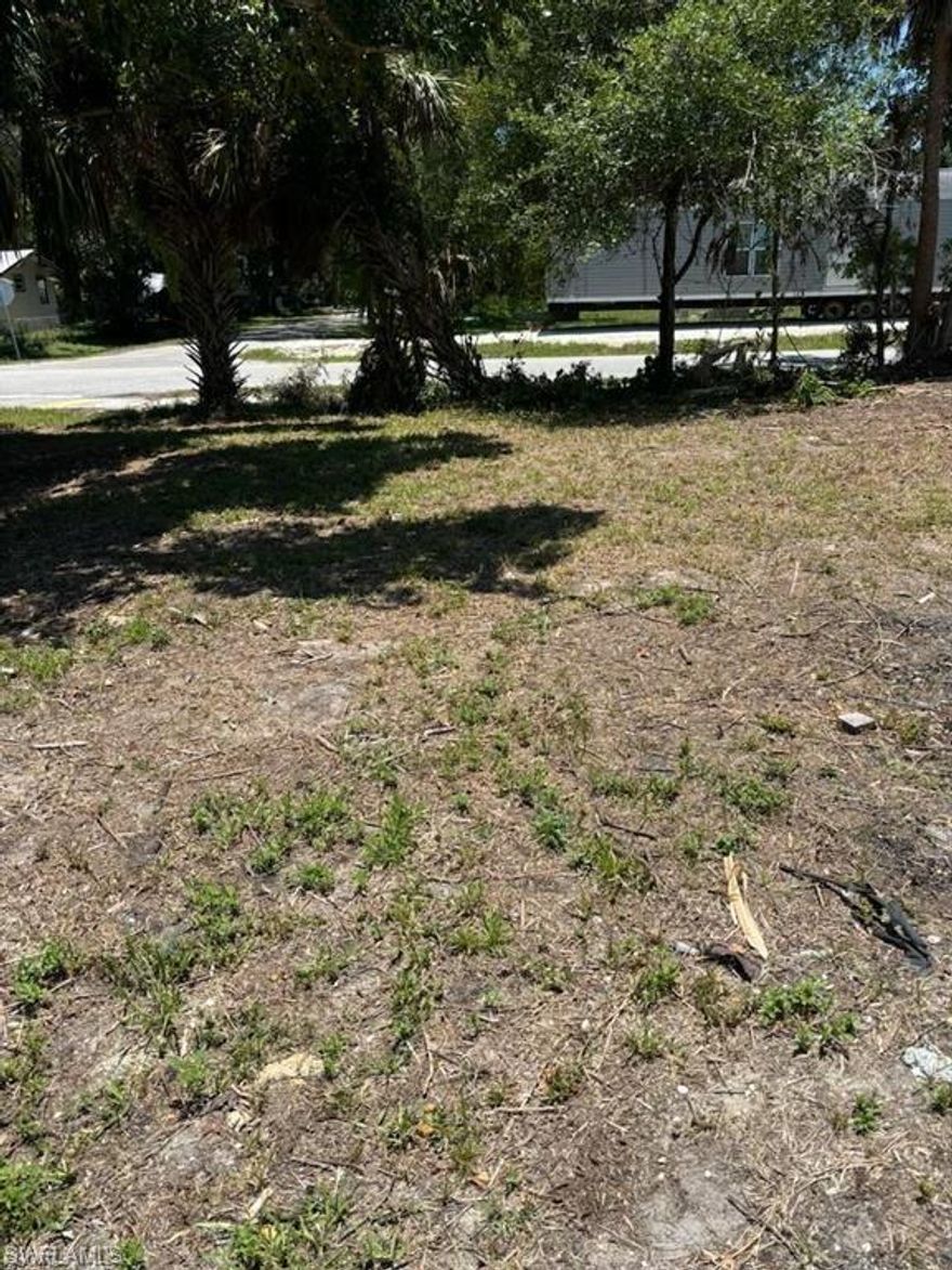 Fantastic Opportunity to Build Your Dream Home! This lot is located in a highly desirable area of North Fort Myers, offering the perfect setting to build the home you have always wanted. Conveniently situated near major shopping centers, restaurants, and essential services, this property provides easy access to main roads and highways for a smooth commute.