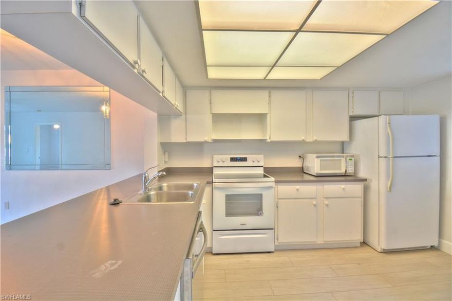 Available March 15th , No PETS, Water and sewage are included. Welcome to this charming 2-bedroom, 2-bath condo located in one of Naples’ most desirable school districts. Tucked away behind Boston Beer Garden, this cozy residence offers a peaceful setting away from highway traffic and noise. The condo features wood-look tile flooring throughout, a bright and functional layout, and a relaxing landscaped view. The kitchen is equipped with a brand-new double-door refrigerator. Water and sewage are included. Conveniently located near shopping, dining, and everyday essentials—this is comfortable Naples living at its best.