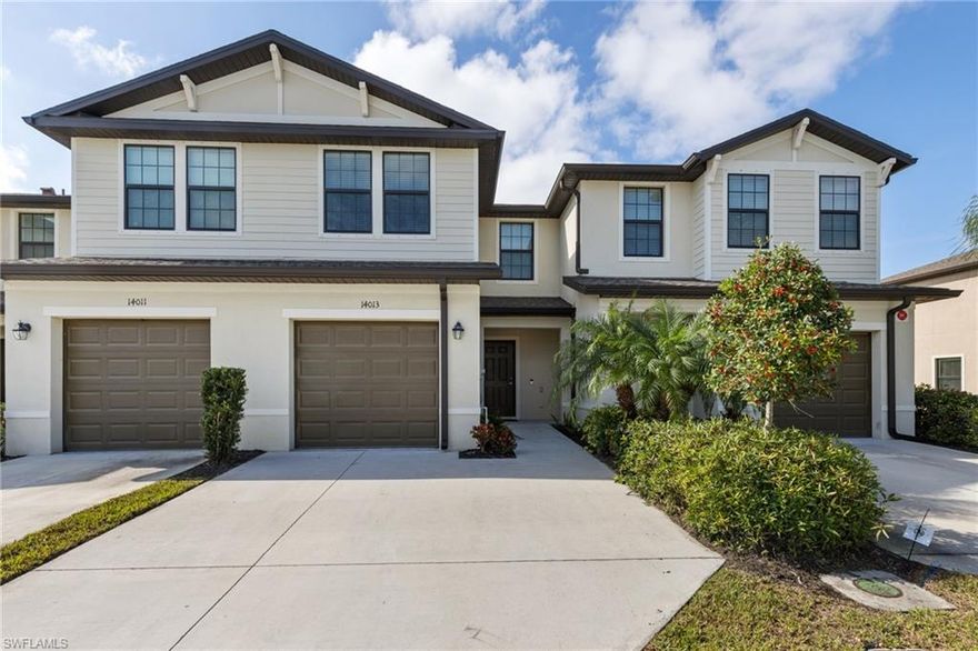 Step into this beautifully maintained townhome and experience the easygoing lifestyle that Portico has to offer. This gated community provides convenient access to I-75 and features a clubhouse with fitness facilities, a resort-style pool, tennis and pickleball courts, and a playground that overlooks landscaped lakes that showcase Florida's natural beauty. Inside, the southern exposure fills the cozy living room and modern kitchen with warm natural light. The kitchen features stainless steel appliances and a center island, perfect for casual dining or entertaining. The first floor also includes an attached one-car garage, a convenient half bath near the foyer, a laundry closet, and extra storage beneath the stairs. Upstairs, you’ll find three bright bedrooms and two full baths, including a spacious primary suite with two walk-in closets. With its ideal location and wonderful community amenities, this townhome truly offers everything you need for comfortable living in Southwest Florida.