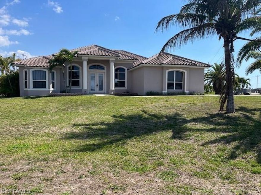 If you want WOW !! THIS IS IT--BIg beautiful house it  sits on a corner with an extra lot on the side .Very impressive not your normal rental Varity of Palm trees in the front yard with an exceptional veiw out the back straight to the water . French doors over looking the pool  with many windows with water view . Living room is large with built in shelves . Master bedroom walks out to pool . Kitchen is great upscale stainless appliances with a built in WINE COOLER . Kitchen has lots of cabinets-- laundry room also has cabinets and a wet sink if tenant doesnt have W/D the owner will buy new ones . The bedrooms are good size and the den is seperate from the guest bedrooms. All clean and fresh paint worth looking at No SMOKERS!!!!!