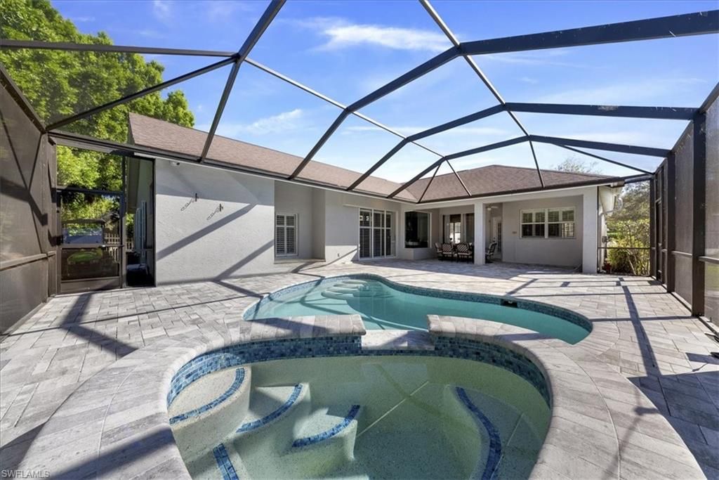 Photo of 297 Sawgrass CT, NAPLES, FL 34110 (MLS # 226005126)