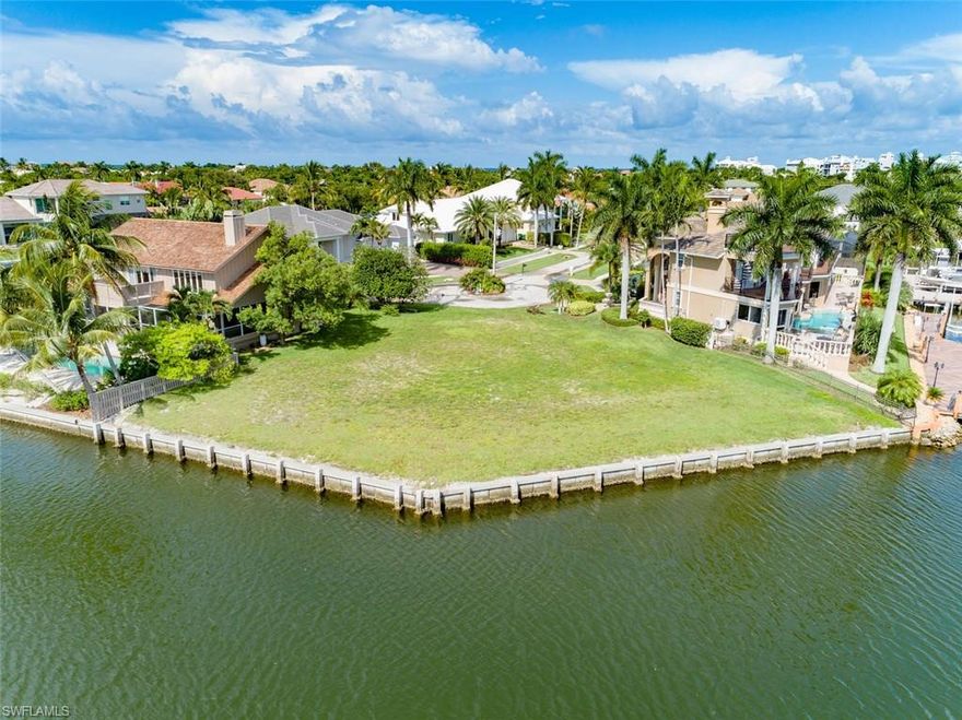 Spectacular Marco Island Water Views. Own one of only 10 homesites on the Cul de Sac. Rare, Water direct access tip lot, 165 ft of waterfront on Collier Bay with direct access to the Gulf.  Build your dream home on this tip lot, no obstructions, no bridges. Live in the enclave of the Tigertail Beach community, about 1 mile to beach entrance.  Surrounded by beautiful multi/million dollar homes. 1.25 mile to Esplanade, shops and restaurants.
