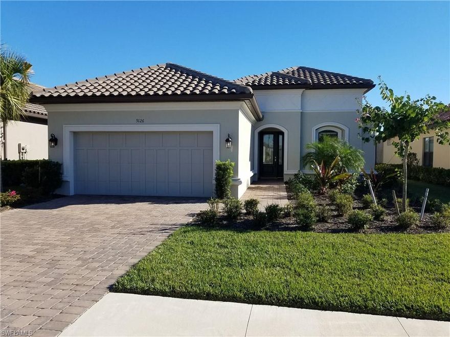 THIS BRAND NEW, NEVER LIVED IN 3 BED 31/2 BATHS, LAKE AND GOLF VIEW (each bedroom has its own bathroom) IS READY FOR IMMEDIATE OCCUPANCY. Tile Upgrades, Carpet Upgrades, Light fixtures,Wood Floors, Crown Molding, Tile on the Diagnal, Tray Ceilings, Pool and Spa, are only a small portion of a HUGE list of options and UPGRADES. Options and Upgrades total $177,000.. a full list is available upon request with an Offer to Purchase. This home comes with golf membership. So if you want to be all set for the upcoming season be sure to look at this home.