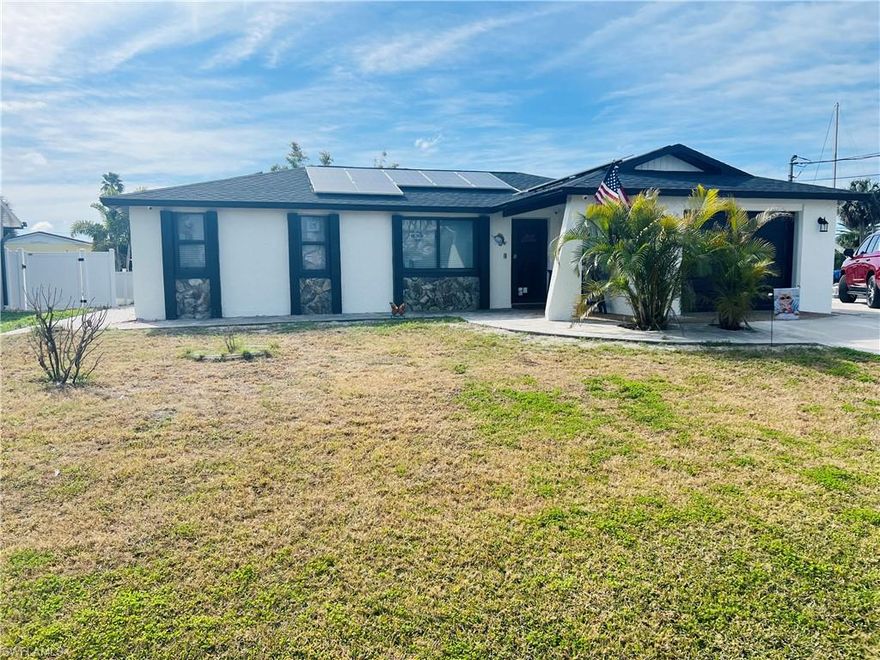 WATERFRONT LIVING AT ITS BEST! This stunning, fully renovated corner-lot home checks every box — from a brand-new roof to a designer kitchen and impact windows and doors throughout. Featuring 3 bedrooms, 2.5 bathrooms, and multiple living spaces, this home is perfect for both relaxing and entertaining.
Step outside to your private screened-in heated pool with a dedicated pool bath and spacious terrace — your own tropical retreat! Bring all your toys: oversized driveway fits up to 8 cars plus RV and boat parking. Direct water access with private boat lift and ramp makes this a boater’s dream, while golf access adds even more lifestyle appeal.
With solar panels for efficiency and upgrades throughout, this move-in ready home offers luxury, convenience, and the ultimate Florida lifestyle. THIS ONE WON’T LAST!