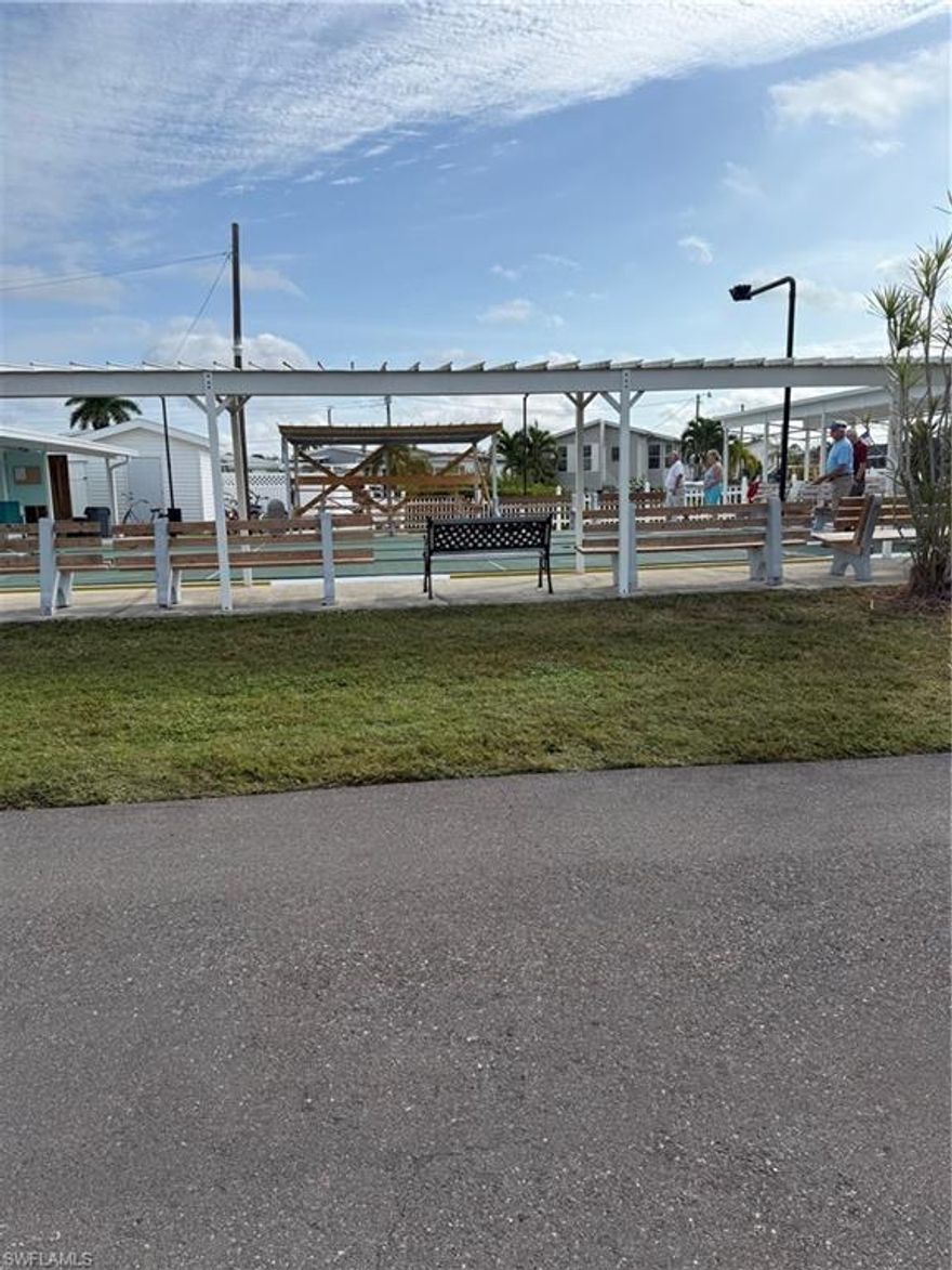 Gulf Access and You own the land. Mariner's Cove Lot has been cleared and has concrete slab. Ready for a new Manufactured or Mobile Home. Central water and sewer included in the HOA fee. Mariner's Cove is a Gulf Access community with boat ramps and slips (wait list). Close to shopping, beaches, Airport, and a great location in Estero. This is a 55 plus and no pet community. Boat Trailor not included.