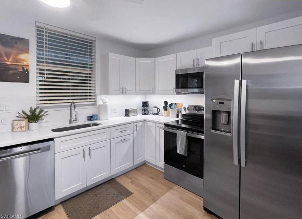 Photo of 5900 Bonita Beach RD #203, BONITA SPRINGS, FL 34134 (MLS # 226017547)