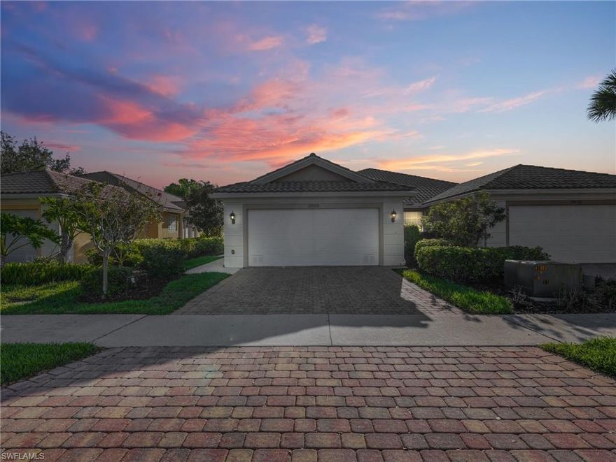Welcome to this well maintained two bedroom plus den, two bathroom attached villa located in the community of San Remo in Bonita Springs. This home offers a functional open floor plan, a two car garage, and peaceful lake views from the screened lanai.

Inside, the home features luxury vinyl flooring throughout the main living areas and bedrooms, with tile flooring in the bathrooms for durability and easy maintenance. The open living and dining area provides a bright and comfortable space with high ceilings and large windows that allow natural light to fill the home.

The kitchen offers generous cabinet storage, ample counter space, and a convenient breakfast bar that overlooks the main living area. The layout makes it easy to cook and entertain while staying connected with family and guests.

Sliding glass doors lead to the screened lanai, creating a relaxing outdoor space to enjoy the lake view and Florida weather. The lanai provides a comfortable setting for morning coffee or evening relaxation while overlooking the water.

The primary suite offers a spacious bedroom and an ensuite bathroom with dual vanities and a walk in shower. The additional bedroom and den provide flexible space for guests, a home office, or a hobby room depending on your needs.

The exterior of the villa features attractive Mediterranean style architecture with a tile roof, paver driveway, and mature landscaping leading to the two car garage.

Residents of San Remo enjoy a gated community setting with a variety of amenities designed for an active Florida lifestyle. Community amenities include a clubhouse, resort style swimming pool, tennis courts, pickleball courts, a fitness center, and scenic sidewalk paths throughout the neighborhood. 

San Remo is conveniently located near shopping, dining, and everyday conveniences, and offers easy access to the beaches of Bonita Springs, Southwest Florida International Airport, and nearby destinations such as Estero and Naples.