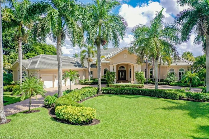 GREY OAKS is one of the most sought after golf & country club experiences in Naples! This is the most grand of all estate homes sitting on over 3/4 of an acre w/ lush tropical landscaping and royal palms line the circular drive take your breath away! Drive up through the beautifully constructed porte cochere, this estate home features 4BR+Den, Exercise Room, 4.5BA & 3-car garage w/ new epoxy flooring. One story living w/ travertine flooring throughout and windows everywhere! JUST PAINTED, Light & bright w/ sun drenched northern exposure over the Palm Course. Gorgeous LAKE & GOLF COURSE VIEWS from every room! Master suite is exceptional w/ beautiful views! Guest BR's are spacious w/ new neutral carpets. The chef in your family will love the kitchen, including a separate bar & beverage area, granite countertops w/ large island, plenty of storage & cabinet space & high-end appliances. Enjoy the spectacular views of the Palm course & lakes from the fantastic outdoor living area, a sparkling pool & spa, outdoor granite kitchen, several areas to dine, relax and gather with neighbors, family & friends! Luxury amenities await you..3 golf courses, resort pool, wellness center, spa & more!