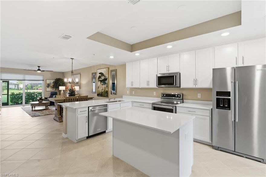 This model-like Condo has over $50,000 in luxury upgrades. Tile floors throughout, Hunter Douglas Motorized Blinds, LG Stacker Washer Dryer, Kitchen Aid Appliances including; Dishwasher, Double Oven Range, Microwave with Convection oven & Air fryer, Custom Florida closets in the owner's suite along with European style glass shower doors in the upgraded bathroom, upgraded plumbing fixtures/sinks throughout, luxury Lighting & ceiling fans, etc. There is also a whole home water purification and drinking water system. Immerse yourself in the resort lifestyle with exclusive access to a gated community brimming with top-tier amenities, including a golf course, resort pools, a state-of-the-art gym, an exercise studio, sauna, and courts for tennis, bocce ball, and pickleball. For those who enjoy fine cuisine, the community offers both casual and luxury dining experiences. Step outside to find the poolside restaurant/bar or indulge in pampering at the full-service spa. Near shopping centers and entertainment venues, ensuring that leisure and convenience are always at your doorstep. Babcock National and Babcock Ranch host live entertainment, farmer's markets, music, etc. Bordered by the 73,000-acre Babcock Ranch Preserve and the 65,000-acre Cecil M. Webb Wildlife Management Area, Babcock Ranch is Southwest Florida's newest growth corridor, just 20 miles from the RSW International Airport. America’s first and only solar town, Babcock Ranch.