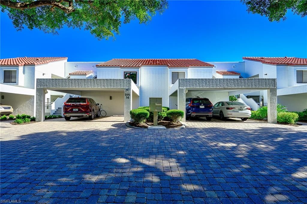 Photo of 595 Beachwalk CIR #M103, NAPLES, FL 34108 (MLS # 226000672)