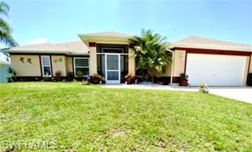 Step into this screened in front entrance and be blown away. This immacuately kept 3 bedroom, 2 bath home located in a great neighborhood in SW Cape is the ideal starter home. This stunner features a kitchen with granite countertops. The home has electric hurricane shutters on the lanai and hurricane impact windows. Beautiful tile throughout the home, with plenty of room for a pool. Don't wait, schedule your showing today!