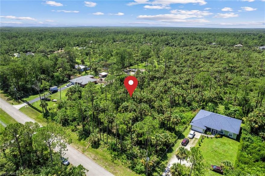 100% UPLANDS!! GREAT OPPORTUNITY TO OWN A 1.14 ACRE LOT IN THE HIGHLY DESIRABLE GOLDEN GATE ESTATES! This beautiful vacant lot offers plenty of space to build your dream home, with room for a guest house, pool, garage, or barn. Enjoy no HOA restrictions, peaceful surroundings, and endless possibilities for customizing your property to suit your lifestyle. Located just minutes from Collier Blvd, shops, schools, and the newly developed Big Corkscrew Island Regional Park, this lot provides the perfect balance of country living and city convenience. Golden Gate Estates is a growing community known for its privacy, space, and family-friendly atmosphere.