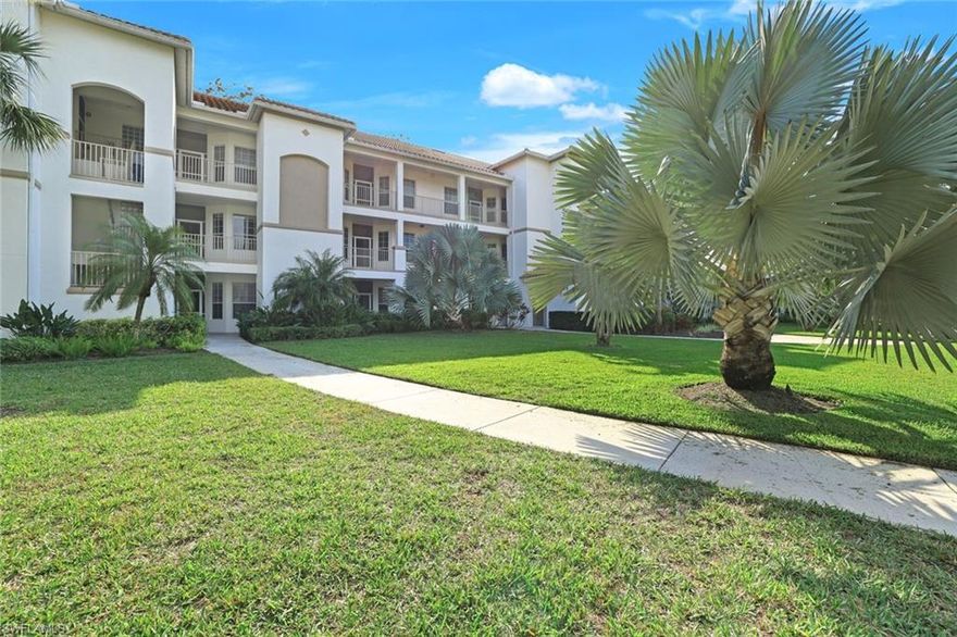 THREE BEDROOM END UNIT, turn key condo at Vanderbilt Country Club, a bundled golf community! You will love this furnished residence with luxury vinyl floors and a lanai that overlooks a stunning view of the golf course makes this condo a true gem. The home has a new air conditioner, lots of light, and a covered parking space. The community has 3 satellite pools as the new main pool is nearing it's completion.  The building location is perfect as it is close proximity to the pool, clubhouse and vibrant terrace cafe. The community is active with outside dining, dancing under the stars, fantastic Caribbean beverages and great food options from the club chef, all in a "blue zone" community.  The list goes on and on of the varied activities for one an all. There is a "vibe" here that is contagious with laughter & comradery!  Bundled golf with a challenging course with views of the 11th green and flush with  eye popping landscaping and flowers, as well as driving range over water are hard to beat.  Not a golfer? How about swimming, card games, tennis, cooking events, trivia, volunteering, state-of-the art gym, with on-site massage and PT?  Paradise here is a reality.  Rentals are in high demand here as well, because the word is out.  Come and see what the "vibe" is about.