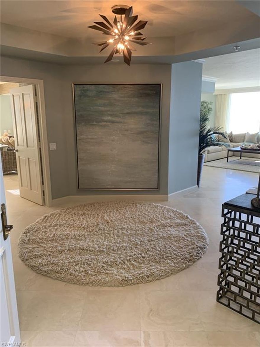 A rare 3 bedroom - 3.5 bath luxury 3,380 sq ft condo directly overlooking the gulf in the Brighton complex in Bay Colony (8231 Bay Colony).

There are no other Brighton condos available on the market.

Updated & freshly painted DELUXE BEACHFRONT South and West corner Jewel showcasing 18 x 18 honed Saturnia marble flooring, completely renovated chef's kitchen and master bath. Be surrounded in the comfort of this casually elegant gem with fine interior detailing. Enjoy the inviting Gulf-Side open air glass-railed West facing lanai from the living, breakfast and very important Master Suite or gather in the family room/den opening to a pleasant screened lanai, perfect for morning coffee. Master bedroom offers stunning south and west Gulf views. Double French doors lead to the sumptuous master bath, offering etched glass shower wall detail, natural stone and marble, plus walk-in custom closet finishes, complete with granite topped his/her dresser. Two en-suite guest bedrooms share a third East facing screened lanai, sure to spoil your family or guests. Brighton is a full-service building, with 24-hour front desk personnel, live-in Resident Manager, social, library and fitness.