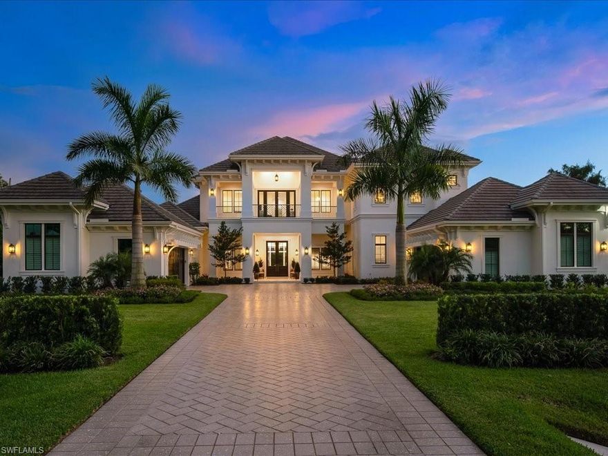 Featuring grand indoor-outdoor living spaces, inspired amenities and a coveted Pine Ridge address, 142 Eugenia Drive is one of the most distinctive estates in all of Naples. This 6-bedroom, 7,500-square foot home offers 6 full and 2 half baths plus exquisite custom design elements for an ultra-comfortable modern lifestyle. The home’s lower level encompasses a foyer, living, family and dining rooms, a full bar, plus an inviting kitchen. Set over a 1.37-acre lot, the home presents entertainment-ready outdoor living spaces—including a 1,500-square-foot lanai, saltwater pool and an outdoor kitchen. Also onsite is an 1-bedroom guest house. Throughout the home, find hardwood floors, custom light fixtures, a stylish kitchen boasting Cristallo counters, an oversized eat-in island with high oak beam ceilings, and a walk-in pantry. The primary suite encompasses a spa-like bath with dual vanities and dual walk-in closets. Additional features include a Control4 smart home system, private elevator, 2 air conditioned garages for up to 4 vehicles and more. 142 Eugenia Drive is conveniently located moments from Naples’ most popular shops, dining, top-rated school districts and white-sand beaches.