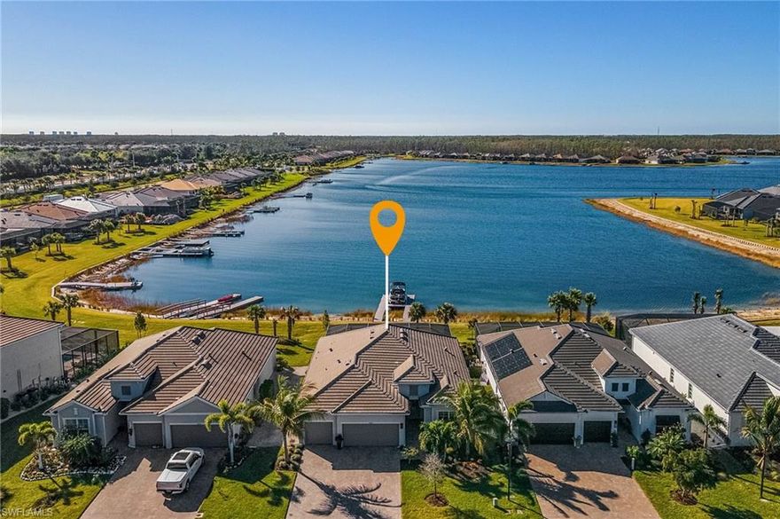 West-Facing Lakefront has some of the best long water views in Vista at WildBlue.  Vista is a 225 Acre Fully Recreational Lake.  Boating, Fishing, Wave-Runners This charming single-story home showcases an open Great Room with access to a Formal Dining space.  Superior Finishes include Crown Molding throughout the home(Feature no longer offered by the builder). The Kitchen and an impressive Lanai flow into in-ground Pool and Spa area, and is covered with a Picture frame Pool Cage for desired indoor-outdoor living. The luxury Owner’s Suite has lake views and private pool access. there are three additional bedrooms which frame the interior. Impact Resistant Glass throughout the home.  One of the few Natural Gas Communities in the area(Spa heats in 10 minutes,  Gas cooktop).  Residents can enjoy an array of upscale amenities including a fully equipped clubhouse, marina, boat launch, swimming pool, fitness center, aerobics studio, tennis/pickleball courts,and newly built. ***DOCK/LIFT/PONTOON not included.   Phase 1 Wildblue Amenities Now Open and Phase 2 will be Completed Soon!