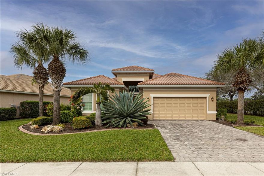 Fabulous corner lot home with significant upgrades and a view overlooking the lake and its majestic sunsets! This home is a must see! The home is loaded with upgrades, a former model home in fabulous Madison Park. Looking for the right house in a pristine development so close to downtown Naples and the beaches with low fees where you don not have to cut your own grass? This is that development and this is that house! The original owner has meticulously maintained the home and it is in just move in condition. Plantation shutters, quartz countertops, upgraded sound system, stainless steel upgraded appliances, upgraded tile, wood flooring in the den and a pool with waterfalls that any potential Buyer will appreciate. The neighborhood is highly sought after with vast preserve and several lakes. Only six miles from downtown Naples with its shopping, restaurants and entertainment.