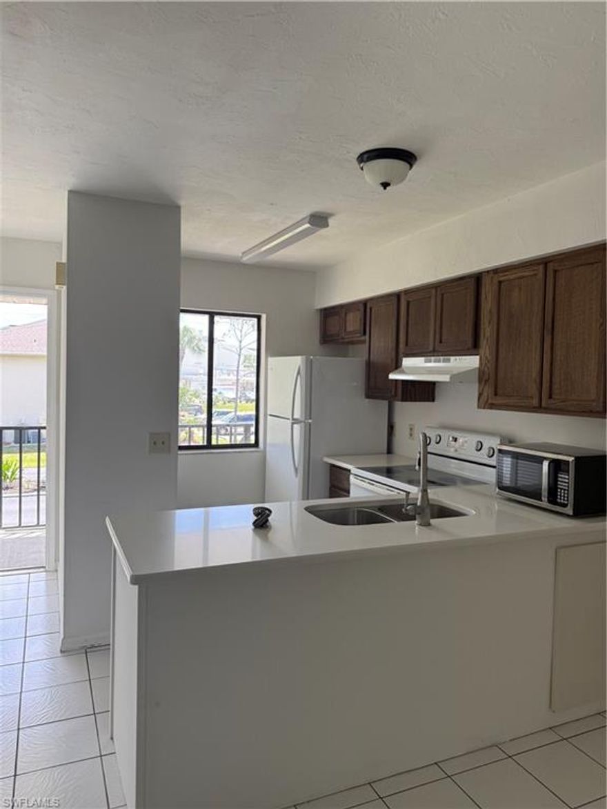 Beautiful 2-bedroom 2-bathroom apartment located in a well maintained and peaceful condo community. This home features tile flooring, a spacious layout, and a large private balcony perfect for relaxing or entertaining. Enjoy the convenience of an in-unit washer and dryer. The community offers a refreshing pool and a quiet, serene environment, ideal for comfortable and stress-free living. Ideally located near major commercial areas, shopping, dining, and everyday conveniences, offering both comfort and accessibility in one place.