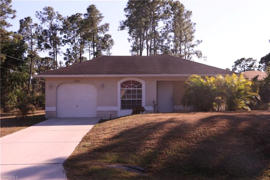 Welcome to your move in ready home! Cozy private front porch! Inside has all been freshly painted. New Curtains, stove, washer, dryer and water heater. Septic drain field and alarm was replaced. Under kitchen sink water filtration system. Low Electric bill. Large private lot ! Owner is related to FL licensed Realtor