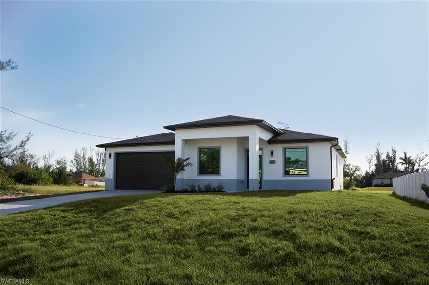 This stunning single-family home boasts 4 bedrooms, 2 bathrooms, and a 2-car garage. This home is sure to impress with granite counters, tile flooring, and modern European-style construction. LED lights, tray ceilings with electric remote-controlled fans, and walk-in closets with shelves add luxury. Located just minutes from Cape Coral downtown and Punta Gorda, this home is perfect for those who enjoy entertainment and convenience. Luxury granite countertops and Samsung stainless steel appliances complete the package.