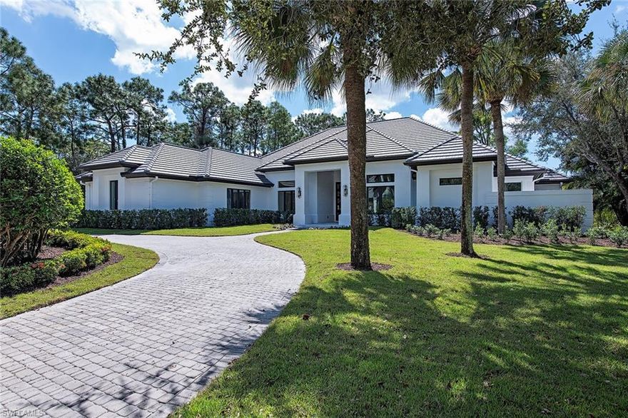 Absolutely stunning with immediate, full golf membership available for purchase. This remodeled Estates at Grey Oaks home sits on a fabulous corner lot overlooking the seventh green of the Pines Golf Course. The expansive, open and reconfigured floor plan has been thoughtfully and beautifully updated throughout. High ceilings, formal living and dining spaces plus an open gourmet kitchen with Wolf and Sub-Zero appliances, a large island, Taj Mahal natural quartzite countertops, prep area and bar. Great room with intricate ceiling details and custom built-in. Gorgeous French Oak throughout living areas. Spacious primary suite with two custom, built-out walk-in closets and large bath. Three generously sized guest bedrooms – all en suite, plus a powder room and full pool bath. All updated. Expansive outdoor living with covered areas, pool, spa, Astro sod, new outdoor kitchen with leathered marble countertops, new fencing and updated landscaping. Complete with a three-car garage. Equipped with Sonos audio, Lutron smart switches, three internet hotspots and wireless pool heater control. Refreshed exterior with new roof and all new impact glass windows and doors.