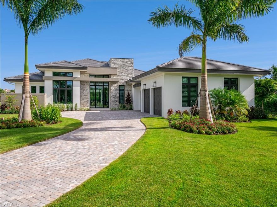 Designer decorated furnished home. An Estate Home by Arthur Rutenberg in the Ancona neighborhood, this designer-furnished model is nestled along the 700-acre freshwater lake and white-sand beach at Miromar Lakes Beach & Golf Club, the #1 Community in the USA. Boat, water ski or wakeboard from your optional private dock, enjoy incredible views of the lake and the Botanical Park in the front yard. Featuring transitional architecture with stacked stone details, the model offers an open floorplan, clubroom with wet bar, den and outdoor living with a linear fireplace, kitchen, covered lanais and custom pool with sun shelf and spa. Luxury abounds with wood flooring, quartz counters, and a chef’s kitchen with Sub-Zero and Wolf appliances, walk-in pantry, freestanding island with a quartz waterfall-edge top and an adjacent wine room and built-in wine bar. At Miromar Lakes, residents enjoy 3 miles of beach and 5-star amenities, including the Beach Clubhouse, Blue Water Beach Grill, 10,000-sq.ft. zero-edge pool, 2 marinas, tennis, bocce, pickleball, Spa & Fitness Center, dynamic social scene and optional membership to the Arthur Hills Signature Championship golf course. Lease Back required.