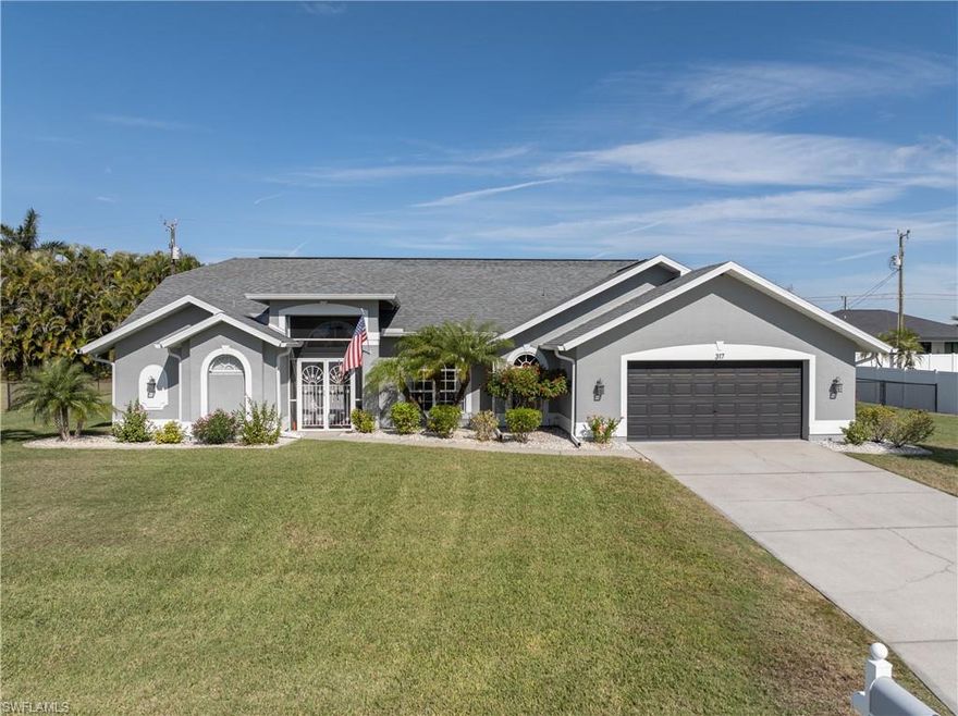 Pride of ownership shines throughout this well maintained 4 bedroom 2 bath pool home featuring a desirable split living and family room layout. The owners have taken exceptional care of the home, with thoughtful updates including, top of line luxury vinyl planking, all new 5" base boards, walk in closets with custom built ins, both bathrooms have been completely remodeled. Newer appliances, roof, air conditioner, under sink RO, and water softener.  It's equipped with security cameras, generator ready electric panel, insulated garage door, organic raised bed garden, storage shed, fenced in yard and an oversized triple lot. City water is in and paid in full and you're in flood zone X (lenders do not require flood insurance.) Accordion style shutters on most openings and panels for the rest. This home is move in ready and very centrally located with easy access to shopping and dinning.