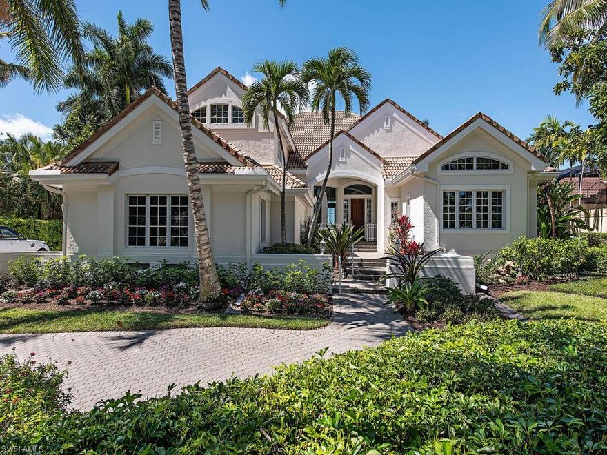 Completely renovated in 2018!  Beautiful western exposure home is just steps to the Port Royal Club and is move-in ready.  This modern residence features an open floor plan with a three-car garage and high-end finishes.  The chef’s kitchen includes a six-burner gas cook-top and large wine cooler, which flows effortlessly to the family room providing unobstructed views of the pool, spa and outdoor living space via an abundance of windows.  Hardwood flooring, quartz, marble and granite countertops and a summer kitchen complete this gorgeous home.  Port Royal Club membership eligible.