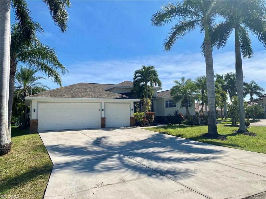 Photo of 4009 SW 27th AVE, CAPE CORAL, FL 33914 (MLS # 2025018218)