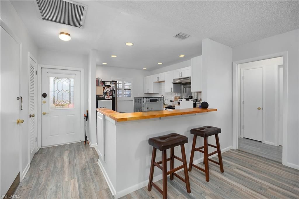 Photo of 1513 Edgewater CIR, FORT MYERS, FL 33919 (MLS # 226018216)