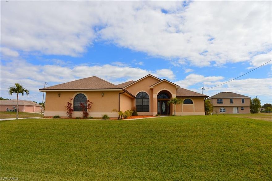 Fantastic pool home move-in ready for new owners with a private lanai! As you walk up to the home you will notice the inviting glass front door welcoming you home. This home features 3 bedrooms plus a den and 2 & 1/2 bathrooms ready for any family with tile throughout all living areas! The master bath oasis has a large walk around shower with extra jetted heads for your enjoyment and duel sinks!! The spacious master bedroom has beautiful tray ceilings and cozy carpeting. The 2nd full bathroom features 18' tile and a shower/tub combo. The kitchen will please any cook of the family with lots of storage and counter space, all wood cabinets and beautiful stainless steel appliances which all convey with the sale. The gorgeous home has 12 ft high ceilings throughout every room- has a formal dining room a large open living space with a built in wall unit also a over sized 3 car garage what more could you need? Don't wait come check out this one of a kind home on a large corner lot with upgraded Floratam Sod for you & your families enjoyment.