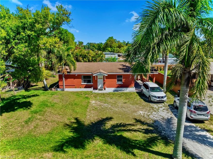 Welcome to this recently UPDATED & freshly painted 3/1 plus 1/1 DUPLEX ready for occupancy on one side conveniently located on a quiet street right off Bayshore Rd. & Tamiami Trail minutes to all major amenities. This property spotlights a (2024) Aerobic septic system, CITY WATER, a (2024) HVAC system & (2023) Mini splits, new water heater, (2016) DIMENSIONAL SHINGLE & modified ROOF, GRANITE COUNTERTOPS, and TILE throughout. It also highlights newer appliances, shaker cabinets, upgraded fixtures, window treatments, open patio & carport, and a common washer & dryer area. It is ready for continued low-maintenance ownership & Ideal for investors seeking rental income or homeowners looking to live in one unit and rent the other. Don’t miss out on this prime real estate opportunity. Schedule your showing today!