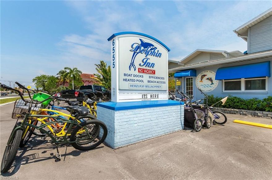 The Dolphin Inn Condo Resort has great reviews and lots of return business. 7% CAP RATE!  The property has been well maintained and managed. 22 RENTABLE UNITS!!!!Heated pool, brick paver, waterfront sun bathing, BBQ grill, tropical setting. This property is a combination of 13 separate parcels that all come with the sale. Start your investments where you vacation, in a property that has a back up plan like this incredible rental machine! 2 showing already set for the week. Come with a strong offer!